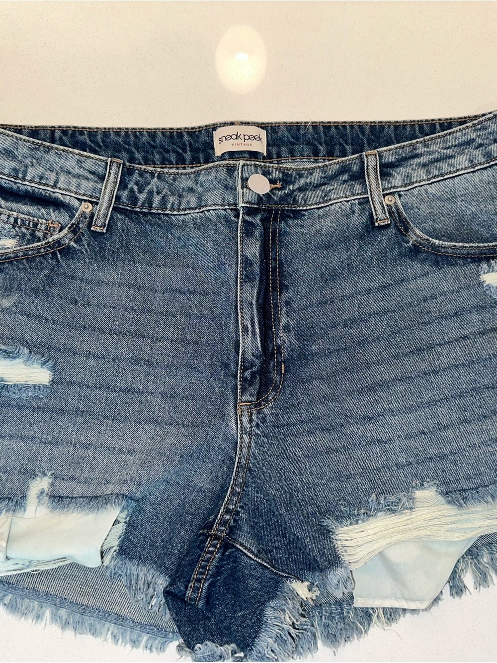 Sneak Peek Light Wash High-Rise Distressed Denim Shorts